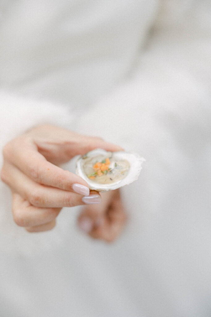 Bride holding Cottage City Oyster